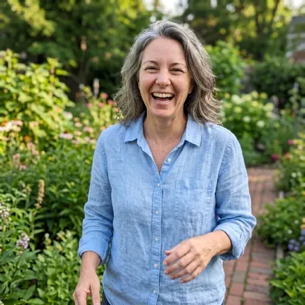 A woman standing in a garden